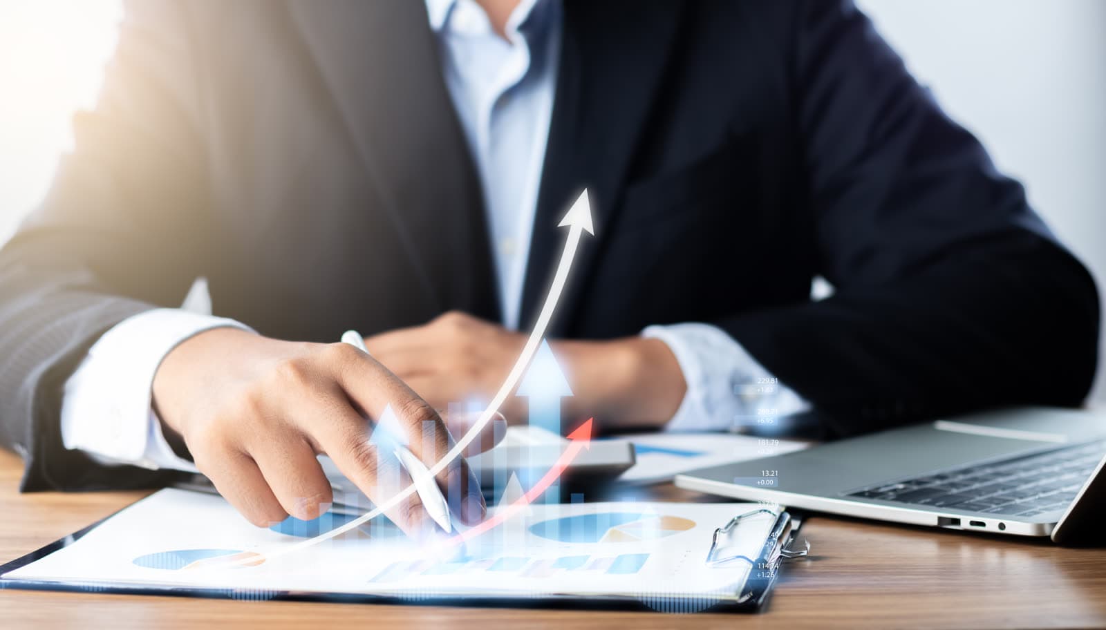 Business owner reviewing financial performance and growth indicators